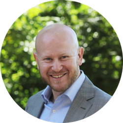 Aaron Saltzman smiling into the camera