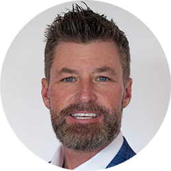 Jeff Paul wearing a suit