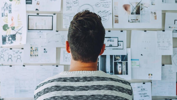 student looking at strategy board