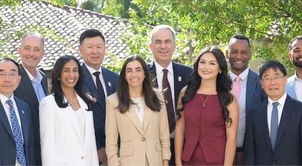 From left to right: Chancellor Jack Hu, Mickey McGuire, Anita Alamshaw, Michael Xu, Jordie Katcher, James Merino, Undergraduate student Shayla Michel, Damon Richardson, Dean Yunzeng Wang, and MBA Student Rhowen Raju