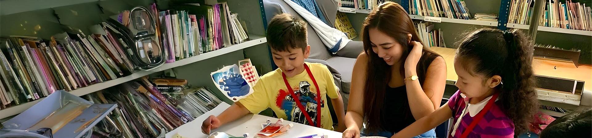 Wendy Romero ’19 BA ’22 MBA, works with children