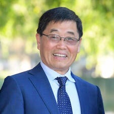 Yunzeng Wang, dean of the UCR School of Business