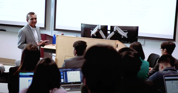 Professor Ashish Sood in classroom 118 in Anderson Hall South