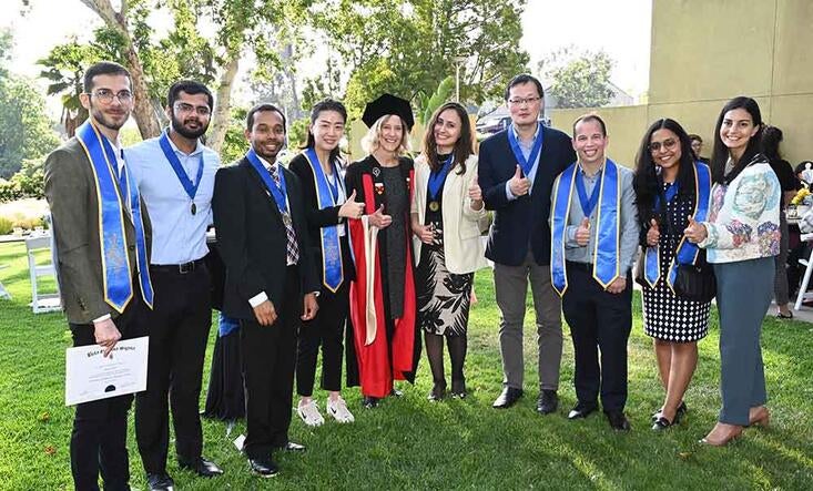 Beta Gamma Sigma inductees with Professor Meg Campbell and Sabine Freij