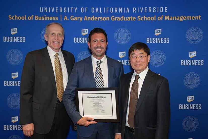 UCR Chancellor Kim Wilcox, Executive Fellow Armen Karamardian, and School of Business Dean Wang